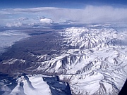Flying over Andes Chile and Argentina below