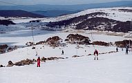 skiing falls creek over the mountain, close to the lake